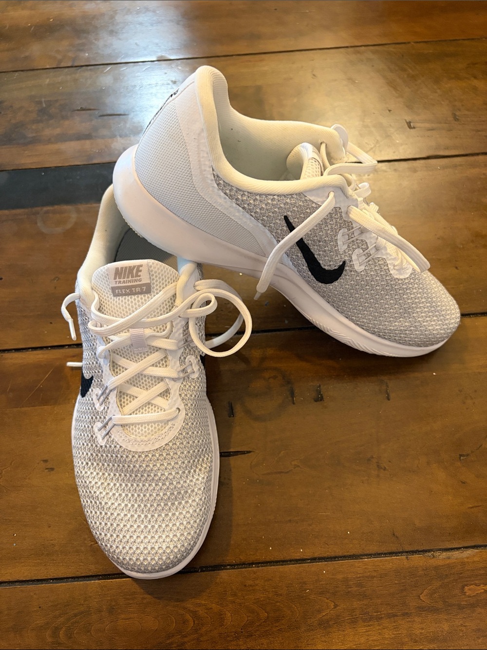 Nike Women's White Mesh Training Sneakers with Black Swoosh